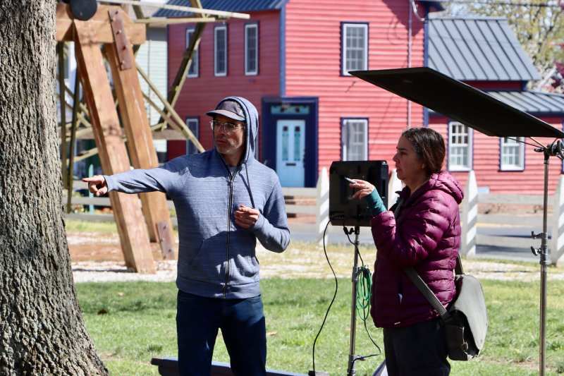 Cinematographer Jesse Beecher, left, and director Jenny Alexander work on setting up the next camera shots outside the Sussex Tavern.